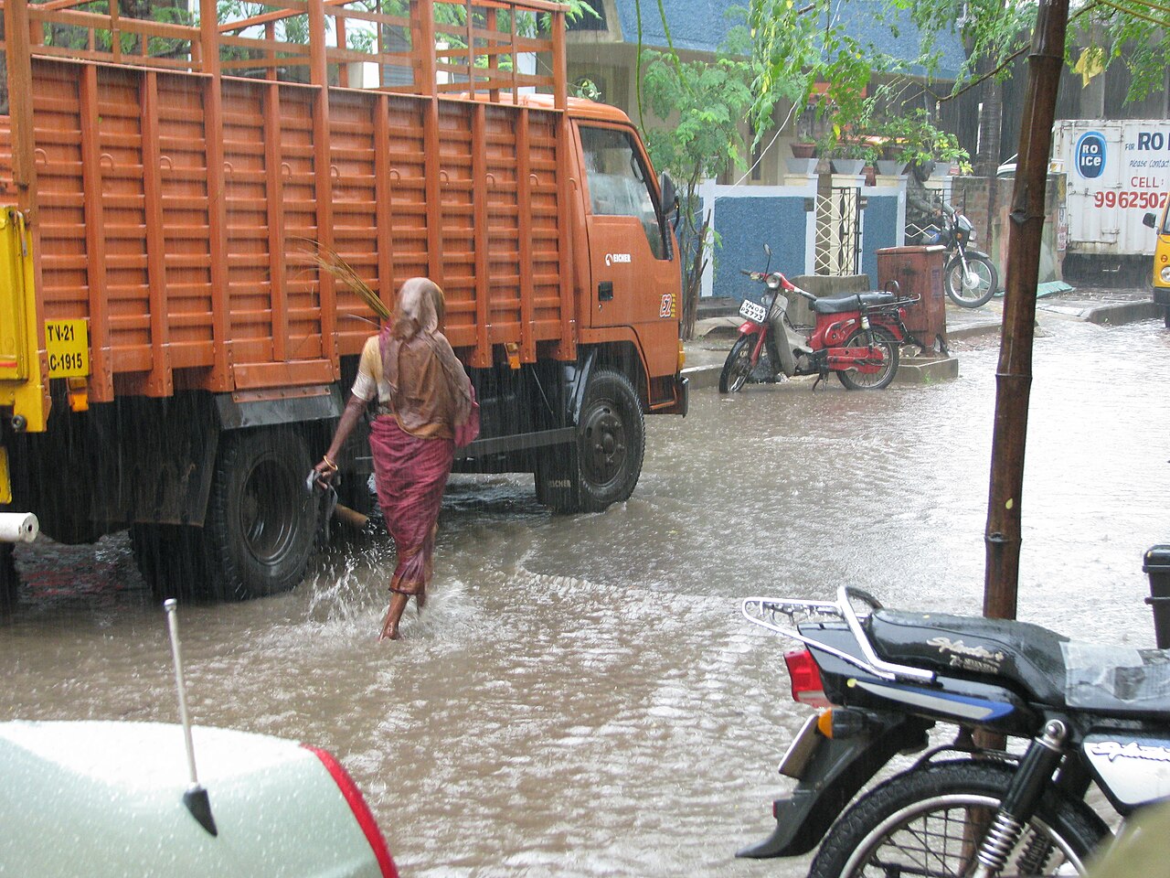 Heavy rain over a city street in the north-east monsoon season